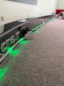 Close-up of the BeamSync LED strip lit green in its extrusion along the boat's gunwale